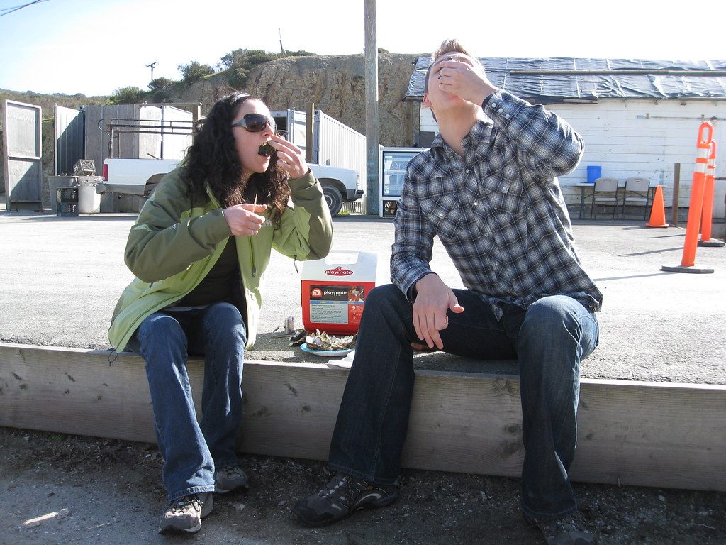Eating oysters at Drakes Bay Oyster Farm, California